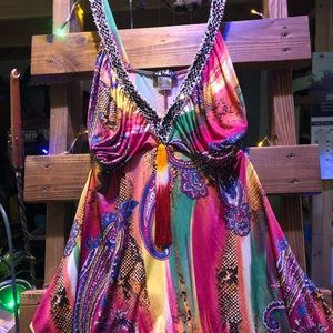 Beaded and tassel top.